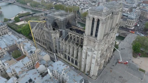 Notre-Dame Cathedral viewed by drone in flight in the aftermath of the fire Stock Footage 114712403