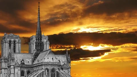 Notre Dame de Paris against the sunset (time lapse, with zoom), Paris, France Stock Footage 265843576