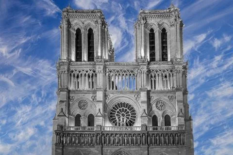 Notre Dame de Paris (against the background of sky with clouds), France 스톡 사진
