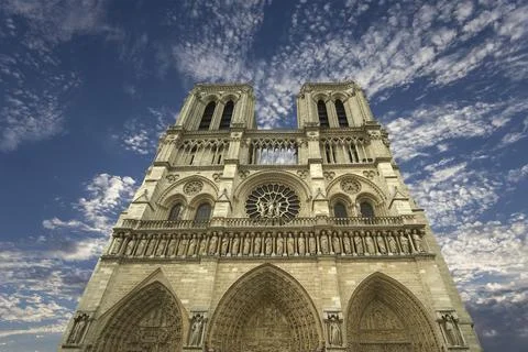 Notre Dame de Paris (against the background of sky with clouds),France 스톡 사진