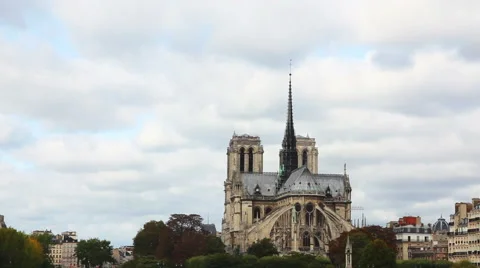 Notre Dame de Paris cathedral on a cloudy day Stock Footage 46900975