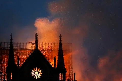 Notre Dame de Paris on fire Stock Photos
