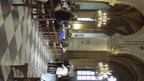Notre Dame de Paris interior with prayers Stock Footage 91151360