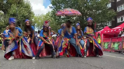 Notting Hill hosts the children's parade of its traditional carnival, Londres, G Видео 344056552