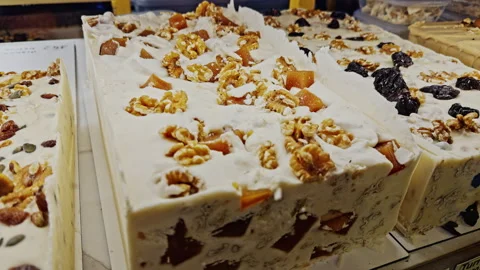 Nougat blocks with nuts on display Vídeo Stock 338294473