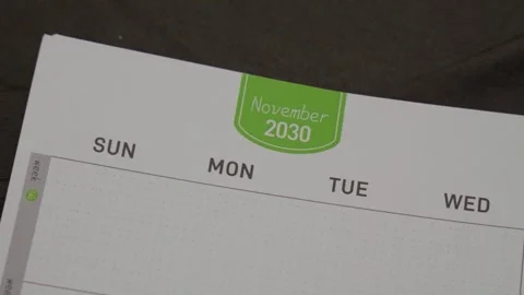 November 2030 planner page close up for monthly scheduling concept with calendar Stock Footage 336485691
