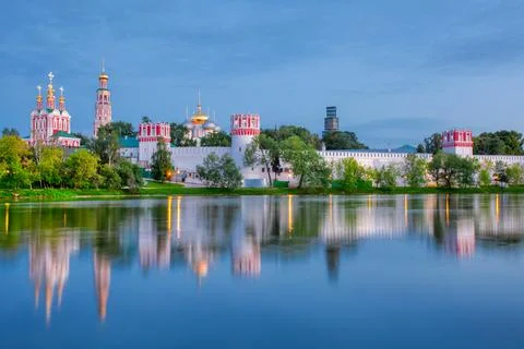 Novodevichy monastery with a reflection in the lake at sunset. The famous Mos Stock Photos