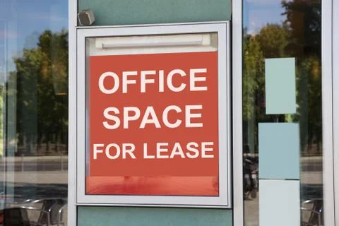 Now hiring sign outside modern office building Stock Photos
