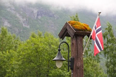 Nowegian flag and lantern in forest Stock Photos