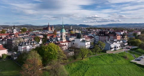Nowy Sącz old town rooftops and church towers in autumn sunshine Видео 346654945