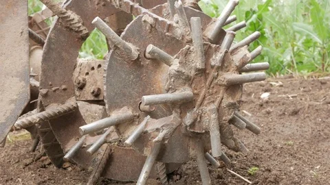 Nozzle behind the tractor for processing the potato field. Landing between the Stock Footage 76953272