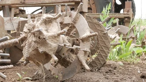 Nozzle behind the tractor for processing the potato field. Landing between the Stock Footage 76968914