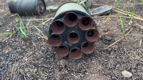 Nozzle in pipe is part of spent rocket projectile that exploded from all side Stockbeeldmateriaal 267252183