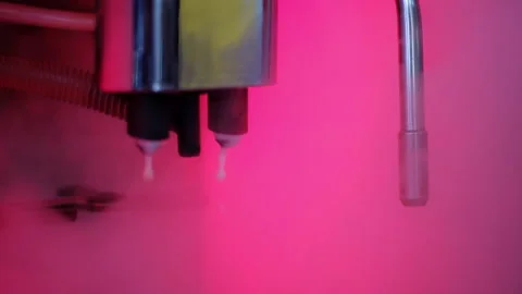 The nozzles of the coffee machine are cleaned with steam Stock-Footage 155963850