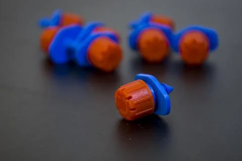 Nozzles for drip irrigation. Selective focus. Stock Photos