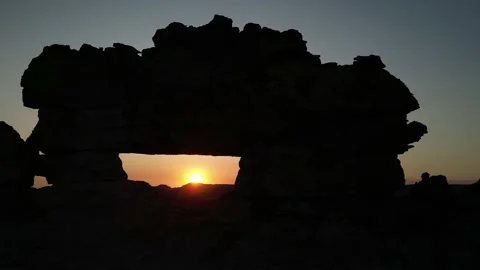 NP Isalo stone window , sunset in Madagascar, Aerial view, 4K footage Stock Footage 231210690