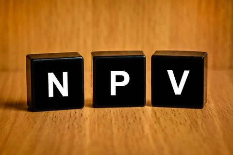 Npv or net present value word on black block Stock Photos