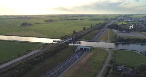 NS Train Crossing Bridge A32 Highway Netherlands / Holland 4K Drone Foo Stock Footage 114890101