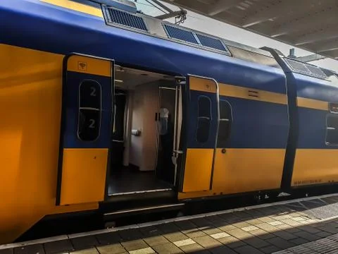 NS train door is open in platform. Stock Photos