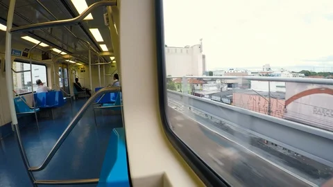 Nside view of passengers in the wagon and traveling along from city Video stock 87221209