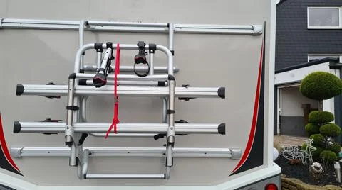 Nstallation of a bicycle stand for e-bikes on the Caravan Stock Photos