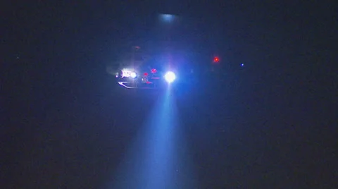 NSW Police helicopter searches at night Stock Footage