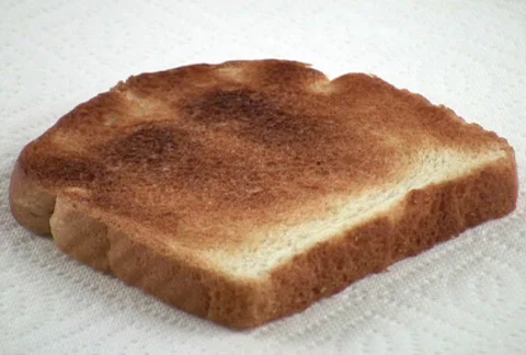 NTSC: Buttering a Piece of Toast Video stock 96206