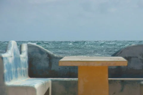 NTSC: Concrete bench at the ocean Stock Footage 153543