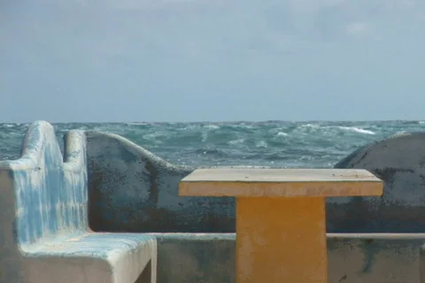 NTSC: Concrete bench at the ocean Stock Footage 153544
