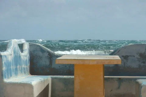 NTSC: Concrete bench at the ocean Stock Footage 153551