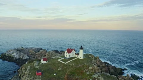 Nubble lighthouse at sunset Stock Footage 148659892