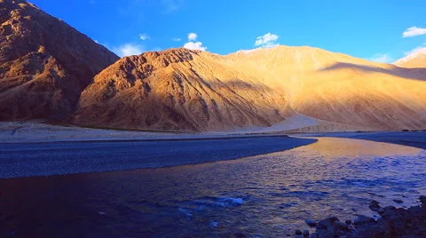 Nubra river at gold sunset Stock Footage 40258227