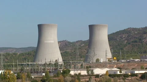 Nuclear cooling towers, two-shot in chaparral landscape Stock Footage 49964174