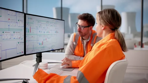Nuclear Engineer Monitors SCADA System Stock Footage 332906702
