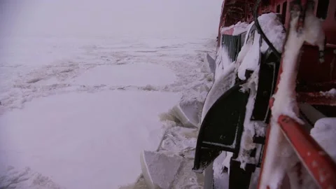 Nuclear Icebreaker Ship Breaking Through Ice ocean in the night Stock-Footage 139856121