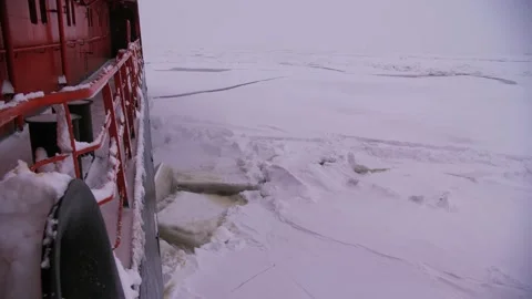 Nuclear Icebreaker Ship Breaking Through Ice ocean in the night Video stock 139856222