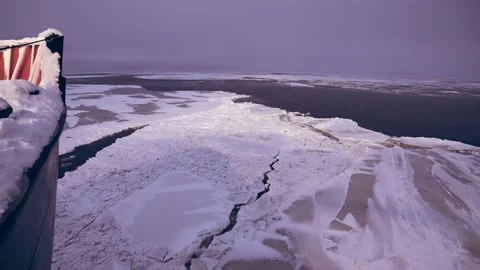 Nuclear Icebreaker Ship Breaking Through Ice ocean in the night Video stock 139956384