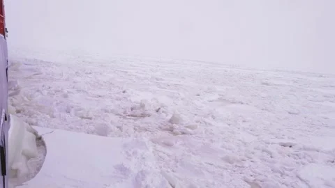 Nuclear Icebreaker Ship Breaking Through Ice ocean in the night Video stock 140248262