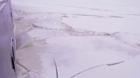 Nuclear Icebreaker Ship Breaking Through Ice ocean in the night Video stock 142186266