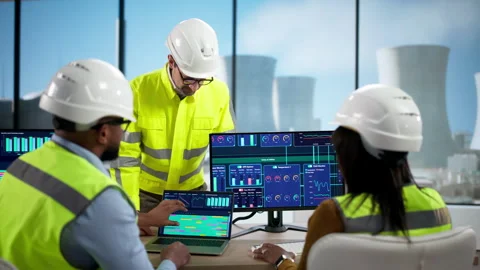 Nuclear Plant Team Using SCADA Software Stock Footage 329678545