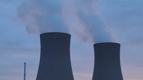 Nuclear power plant against sky at sunset Stock Footage 153282984