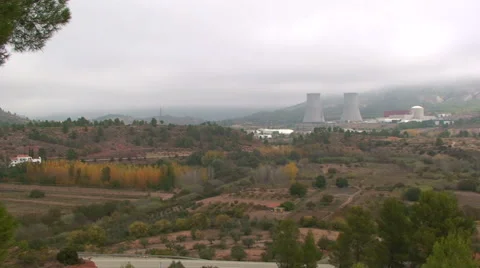 Nuclear power plant with colored deciduous trees in front Stock Footage 49928761
