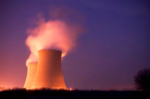 Nuclear Power Plant Cooling Towers at Dusk Stock Photos