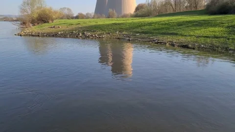 Nuclear power plant by the river Stock Footage 151970854