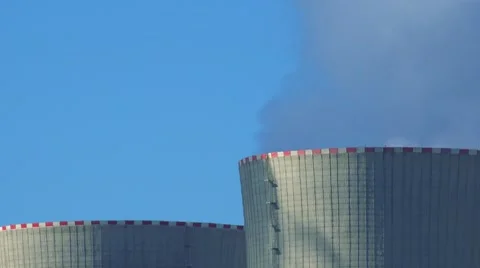 Nuclear power station (four chimneys) - smoke from smokestacks - detail Stock Footage