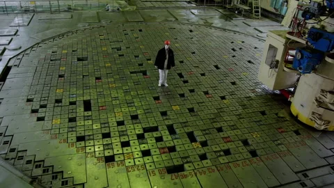 Nuclear scientist walking over the Chernobyl reactor core Stock Footage 332830277