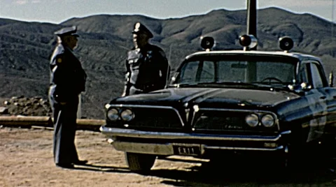 Nuclear test 1963: policemen surveilling the area Stock Footage