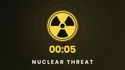 A nuclear threat symbol appears with a countdown timer that shows decreasing 스톡 동영상 347519219