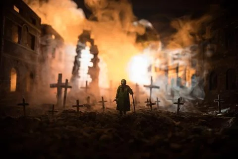 Nuclear war apocalypse concept. Explosion of nuclear bomb in city. Cemetery o Stock Photos
