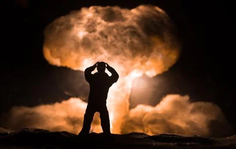 Nuclear war concept. Explosion of nuclear bomb. Creative artwork decoration i Stock Photos